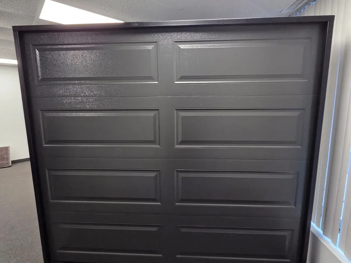 Brown carriage garage door pair installation — Brampton