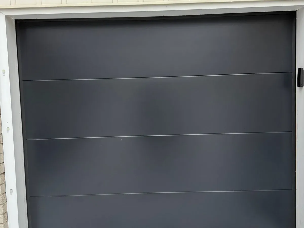 Charcoal double garage door with full window section — Mississauga