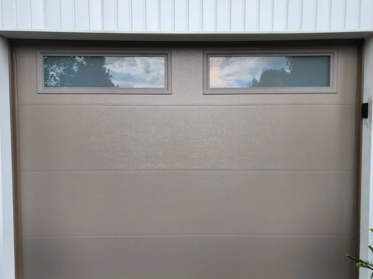Champagne single garage door with top windows — Ontario