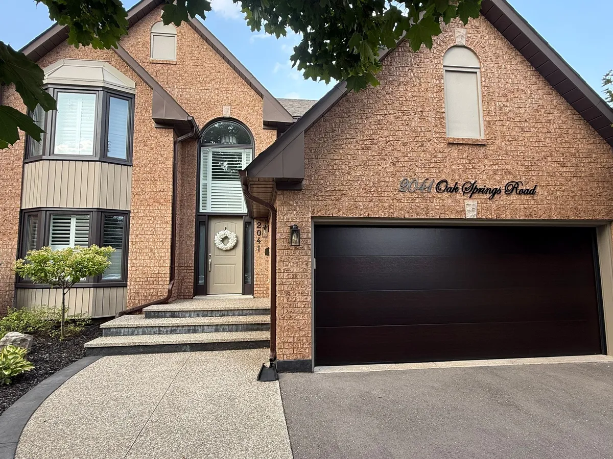 Espresso double garage door full exterior view — Mississauga