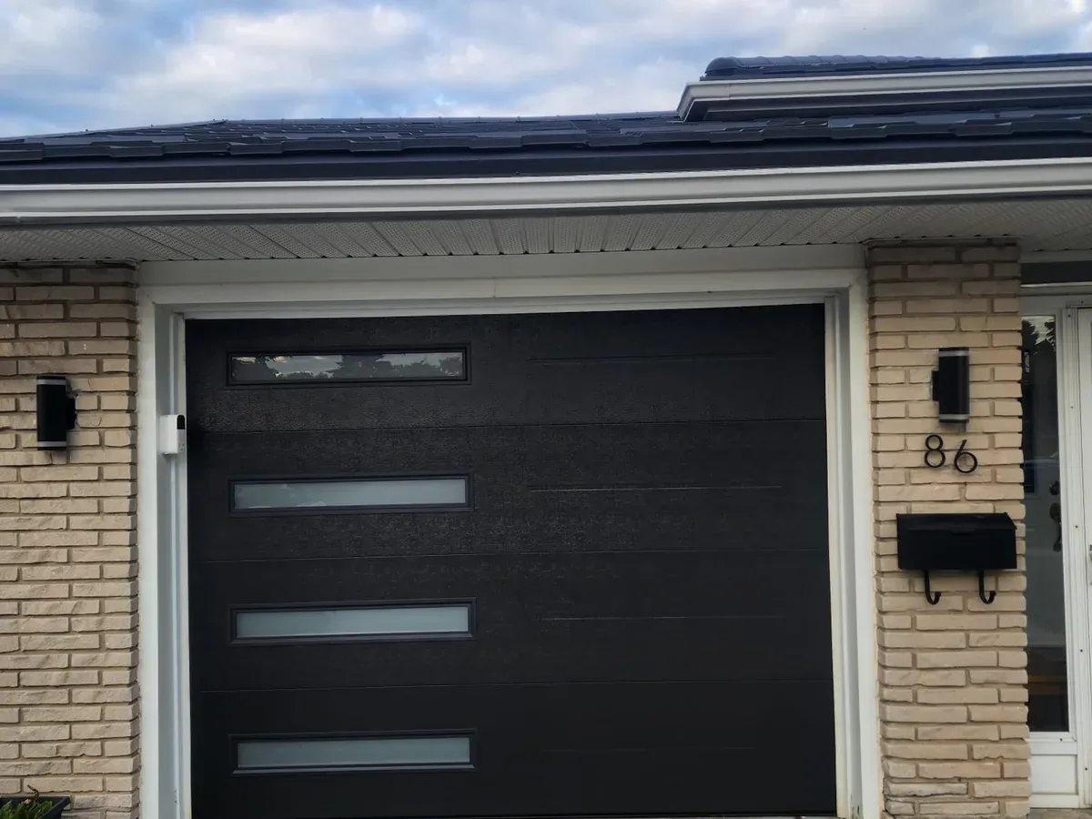 White steel garage door with arch windows — Brampton